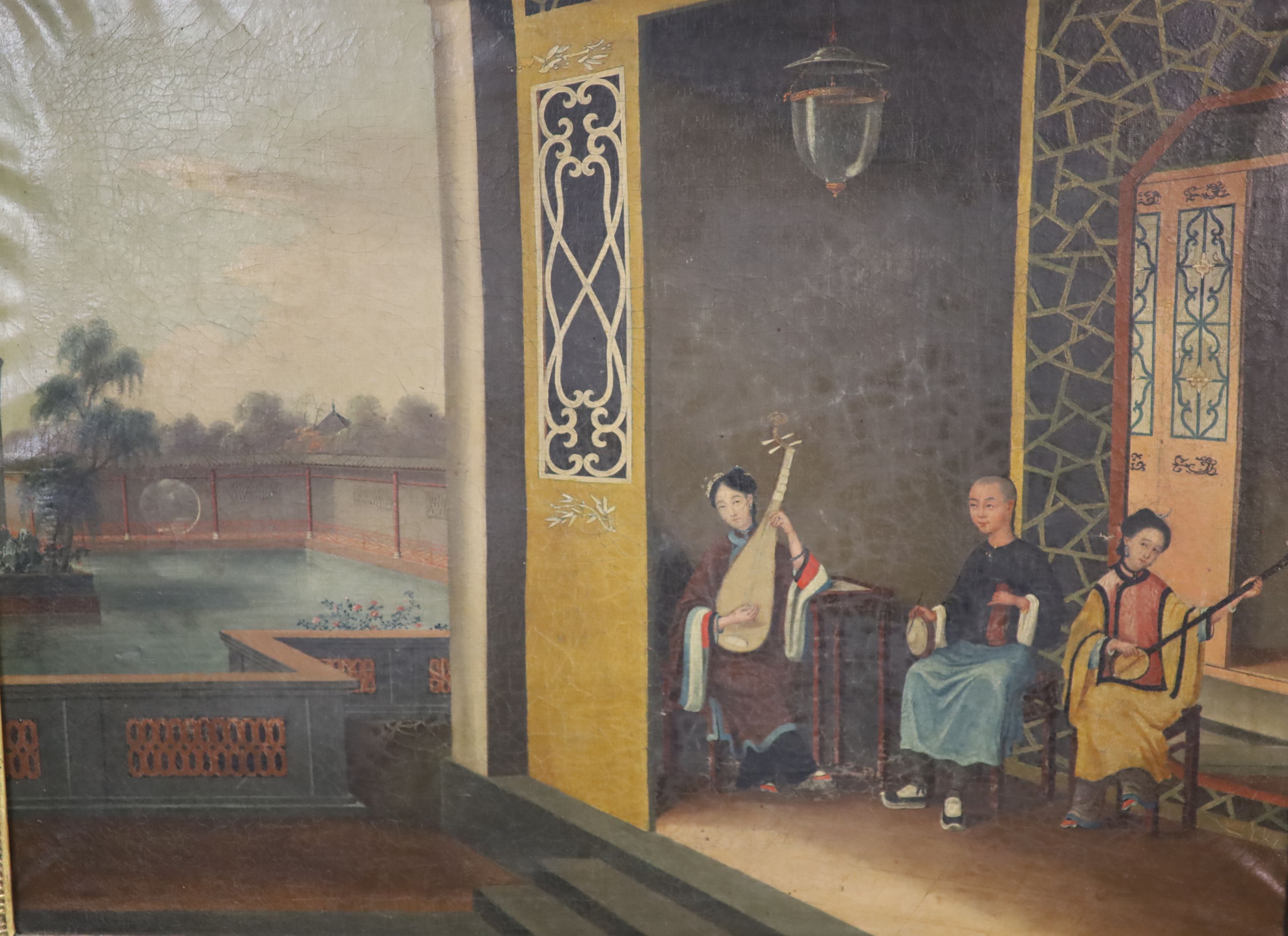 A mid 19th century giltwood and gesso wall mirror inset with a Chinese oil on canvas of musicians within a pagoda, in the manner of Tinqua H.147 cm W.88cm.